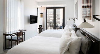 Interior view of the Corner Room with two queen beds.