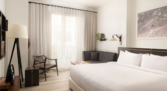 Interior view of the Den Room with a king bed.