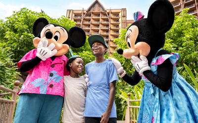 Guests with Mickey and Minnie Mouse characters