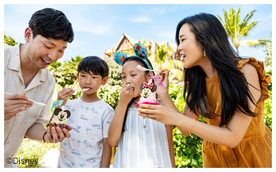 Family eating Dole Whip outside