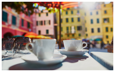 Image of an outdoor café table with cups.