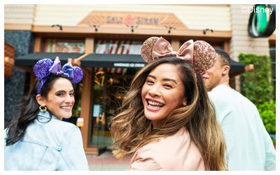 Image of three friends grabbing ice cream and having fun.