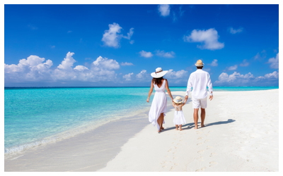 Image of a family of three on a beach