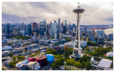 Aerial view of the Seattle Center, Space Needle, Museum of Pop Culture and the city.