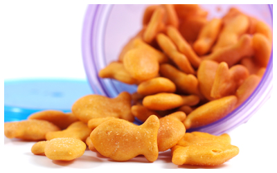 Image of goldfish crackers spilling out of a container